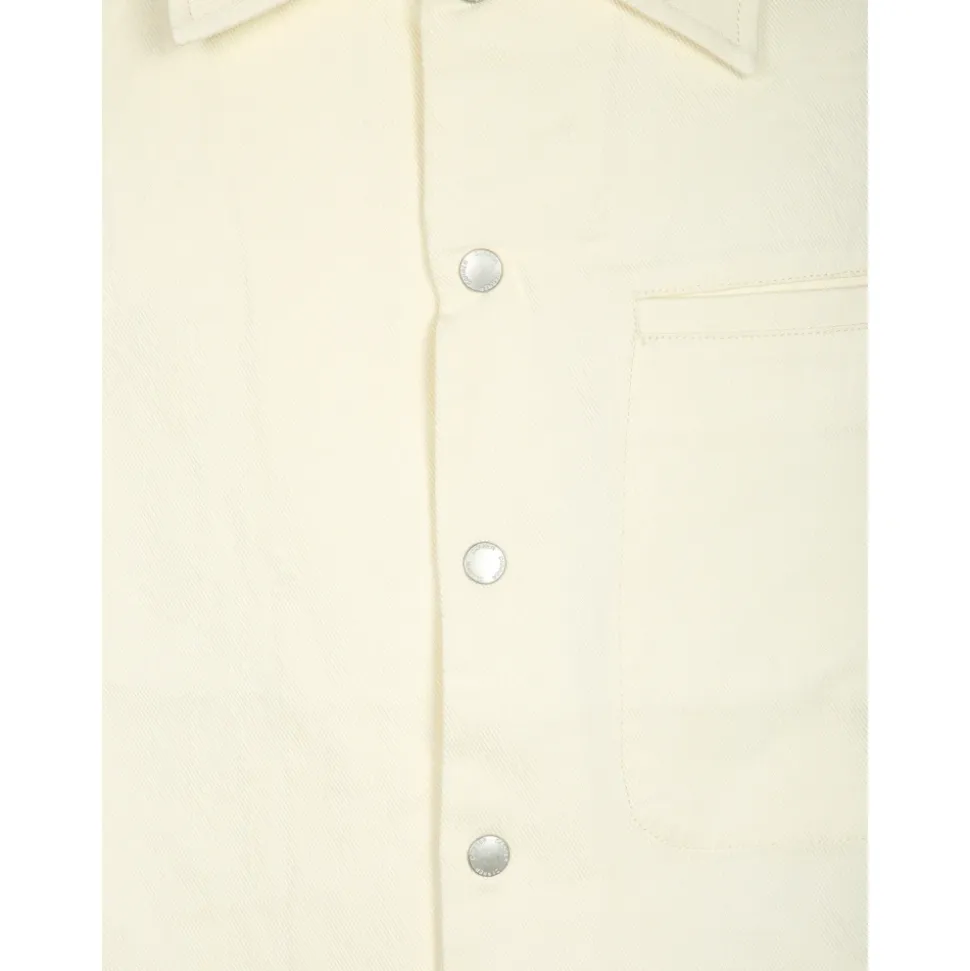 Chemise en tissu écru. Courte