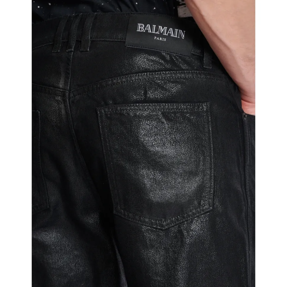 Jean regular en denim enduit