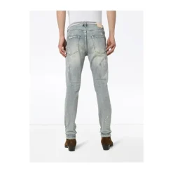 Jeans slim fit peints en blanc