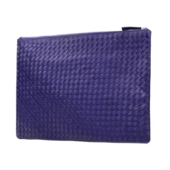 Pochette en cuir tressé à la main en violet intense