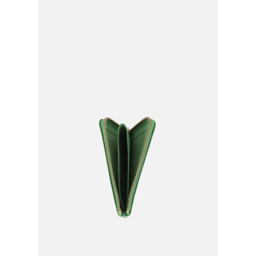 Portefeuille en cuir vert avec détails dorés