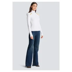 Pull en maille avec boutons dorés