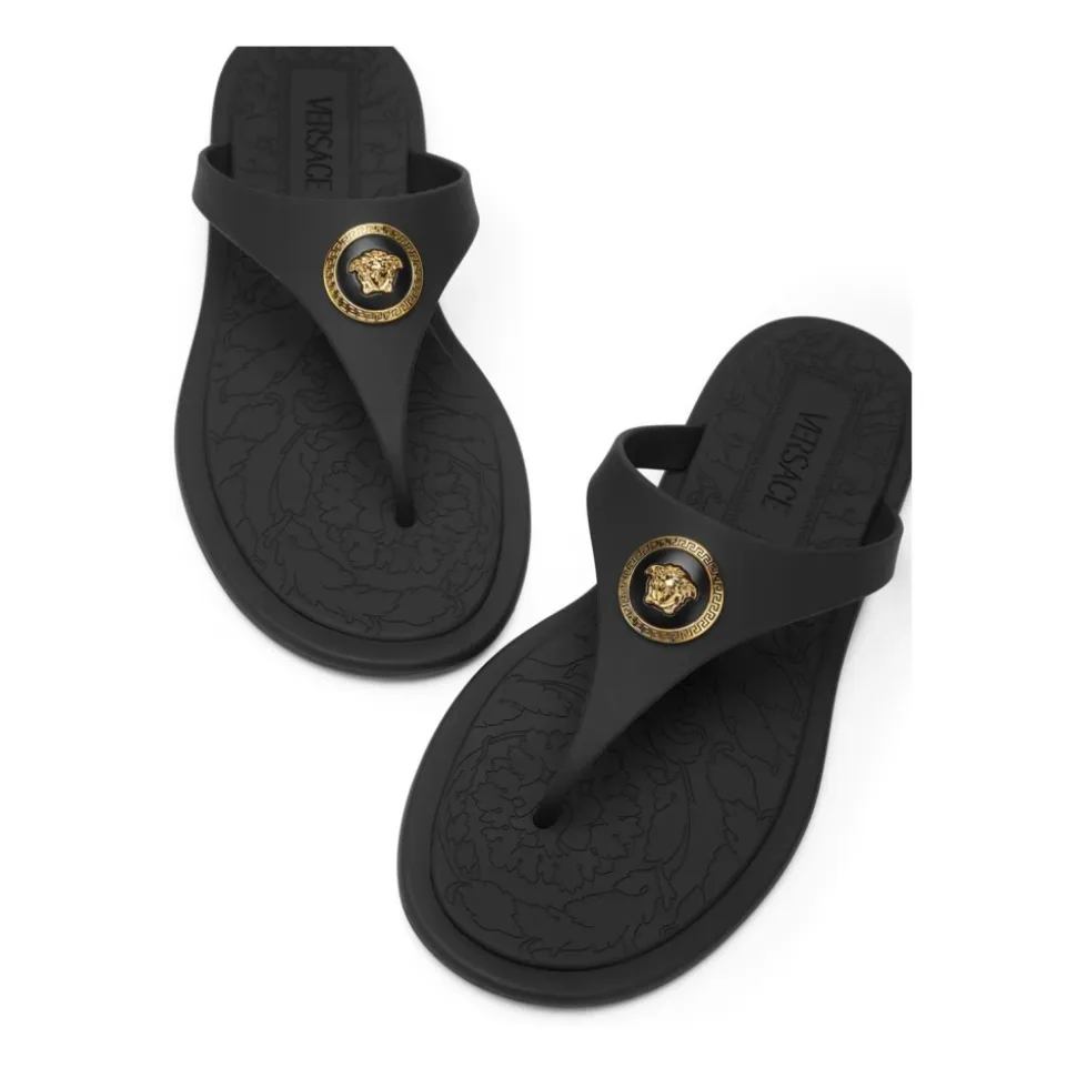 Sandales noires avec motif Medusa